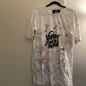 Nine 22 white, grey, red, black. Size L, sits long